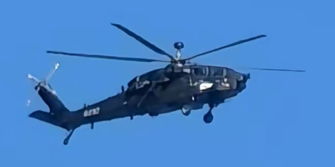 The new PLA Army Z-21 helicopter equipped with a mast-mounted millimeter wave radar during a test flight